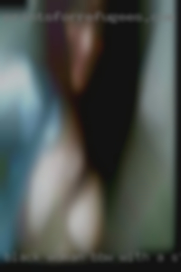 Black woman BBW, with a strap-on.