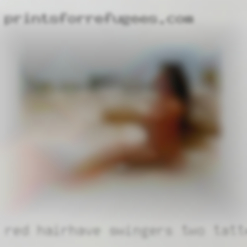 Red hair,Have swingers two tattoos.